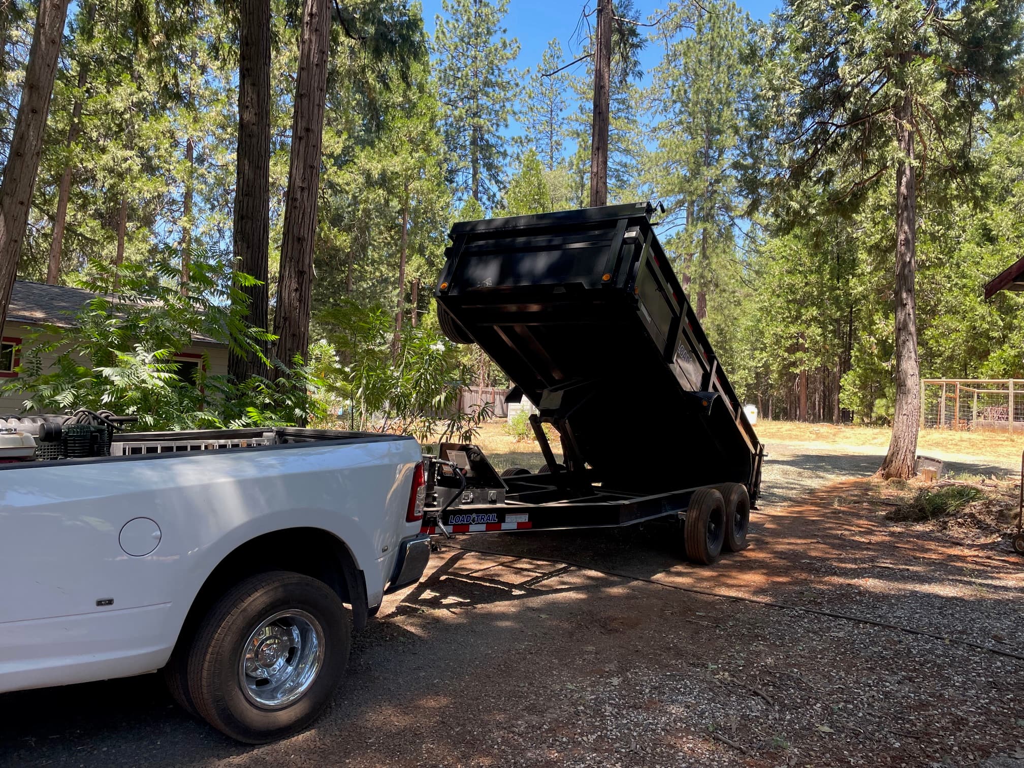 Work truck and dump trailer — Sta-Bull Fence