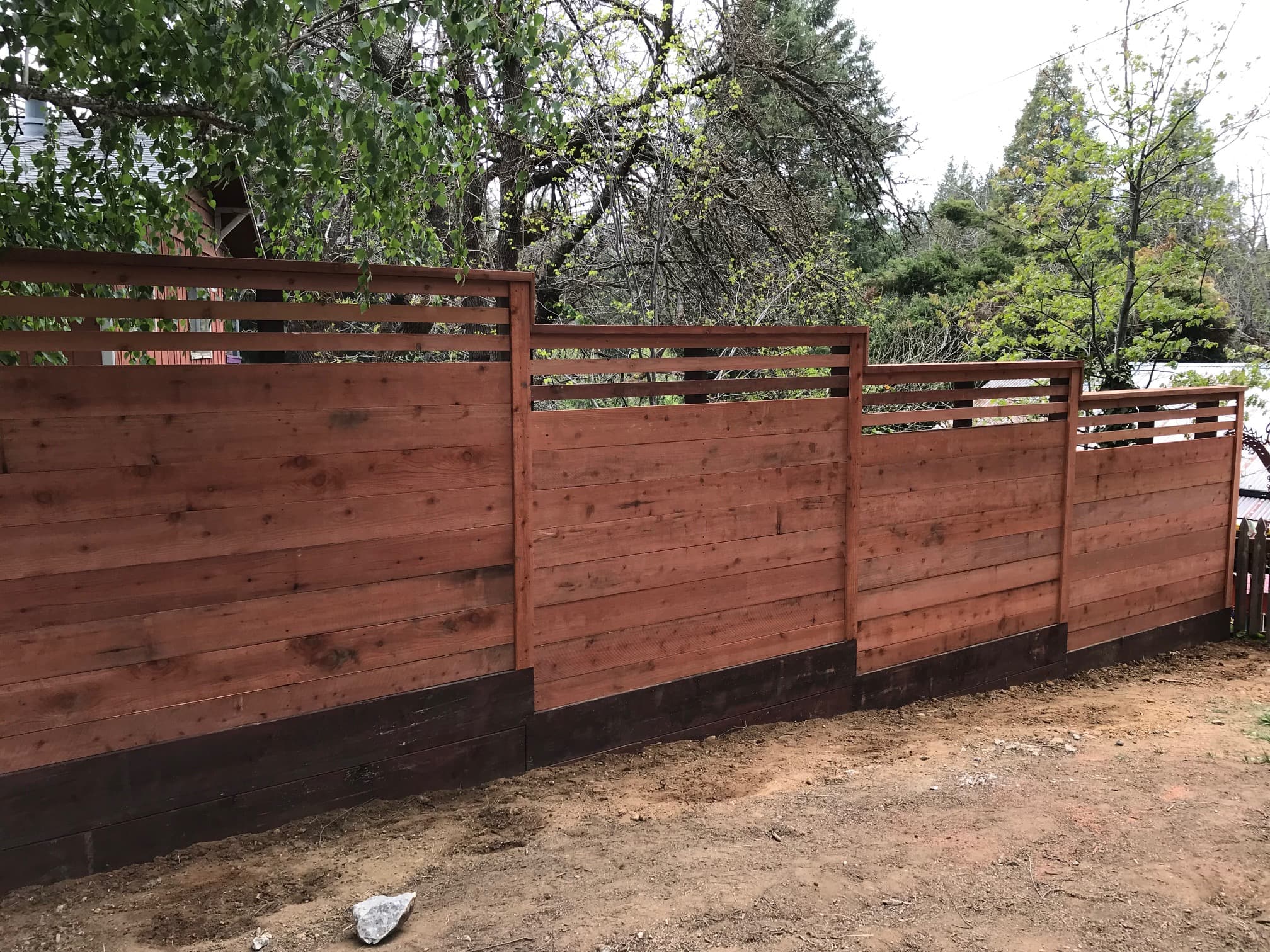 Redwood horizontal fence, end angle view