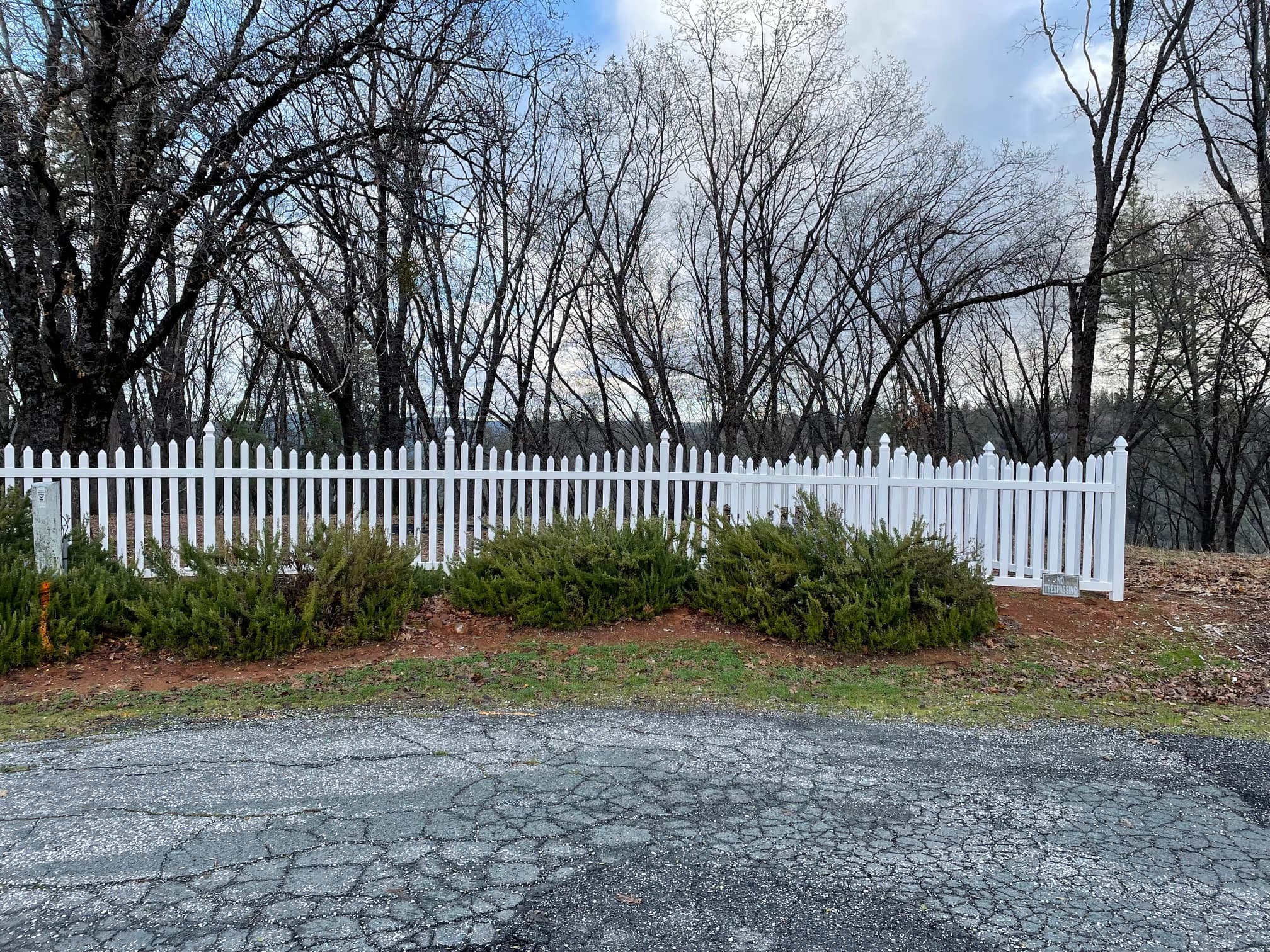White vinyl picket fence, residential Placer County